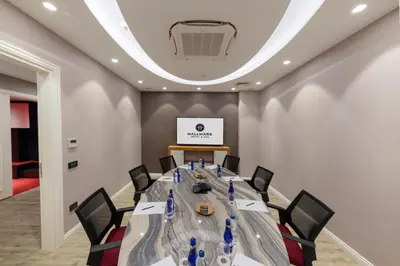 a conference room with a long table and chairs at Hallmark Hotel & SPA Istanbul in Istanbul
