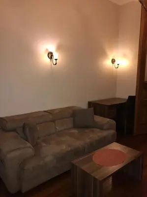 a living room with a couch and a table at Aslan Residence in Istanbul