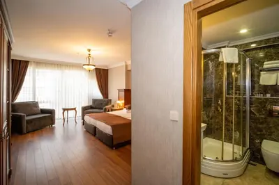 a hotel room with a bed and a bathroom at Hotel Blisstanbul in Istanbul