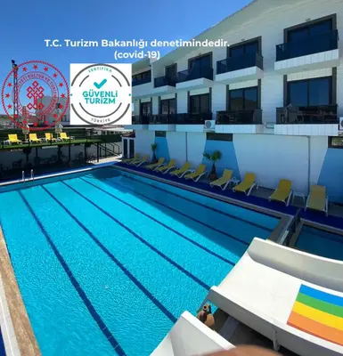 a swimming pool on the roof of a building at ATAŞ AQUA OTEL AVŞA in Samanlı