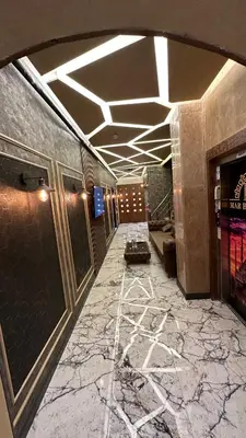 a hallway in a building with a marble floor at Mar Boutique Apartment in Istanbul
