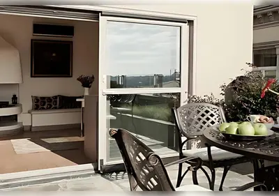 a room with a table and chairs and a window at Baylo Suites in Istanbul