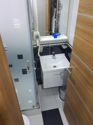 a small bathroom with a sink and a toilet at EYFEL HOTEL in Istanbul
