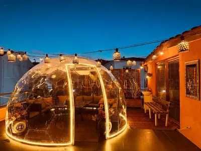 a house with a glass dome on a patio at Waterfront Apartment by the Tram- Terrace with Dome & Golden Horn View in Fatih in Istanbul