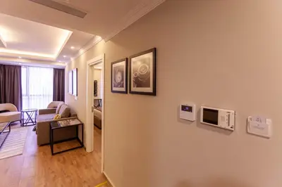 a living room with a couch and a table at Lilium Luxury Suites in Istanbul