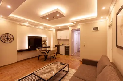 a living room with a couch and a table at Lilium Luxury Suites in Istanbul