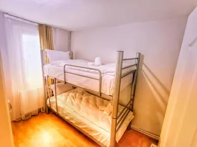 a bedroom with two bunk beds in a room at Taksim History Wooden Hostel in Istanbul