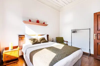 a bedroom with a large bed in a room at Historical Greco-Ottoman Pavilion near Tram in Fatih in Istanbul