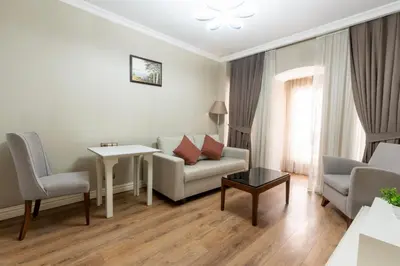 a living room with a couch and a table at 6 Apartment Galata in Istanbul