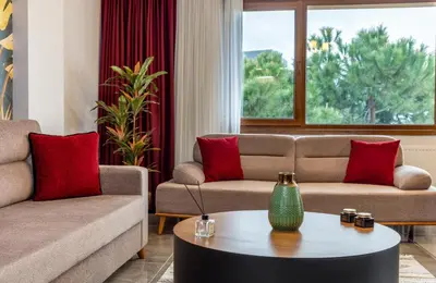 a living room with two couches and a coffee table at Baymari Suites Design Florya in Istanbul