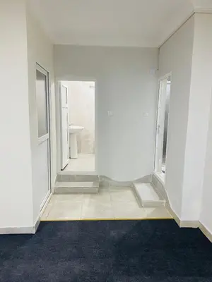 a white room with a door and a window at Stylish Hotel Old City in Istanbul