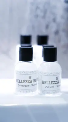 three bottles of medicines sitting on a shelf at Bellezza Hotel in Istanbul