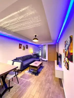 a living room with a couch and a table at Unique/Cosy flat near Taksim/Nişantaşı in Istanbul