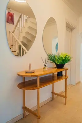 a dressing table with a mirror on the wall at Terra House Sapanca in Sapanca