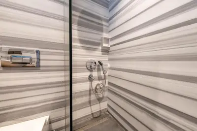 a bathroom with a shower and a toilet at Hotel Balo in Istanbul