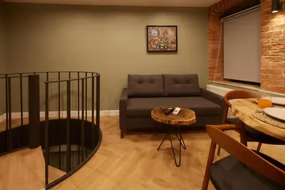 a living room with a couch and a table at CASA GALATA 35 in Istanbul