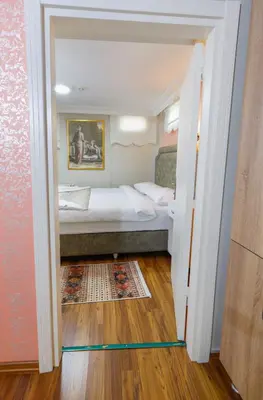 a small bedroom with a bed in a room at Fidelya Boutique Hotel in Sultanahmet