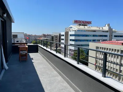 a balcony with a view of a city at İNNPORT HOTEL in Gebze
